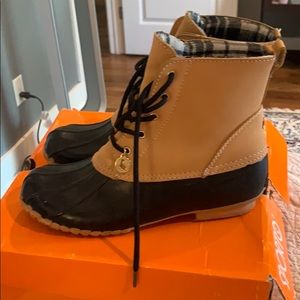 Sporto brand all weather boots.